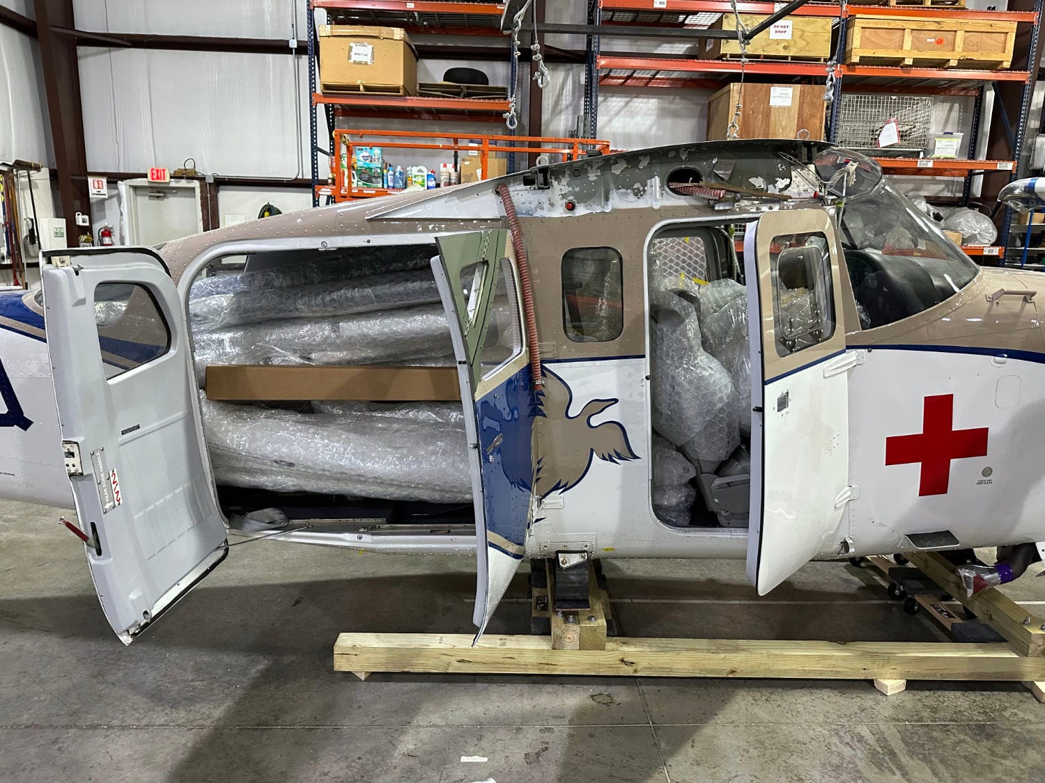 Control surfaces packed into a Cessna U206F fuselage for shipping to Samaritan Aviation in Papua New Guinea.